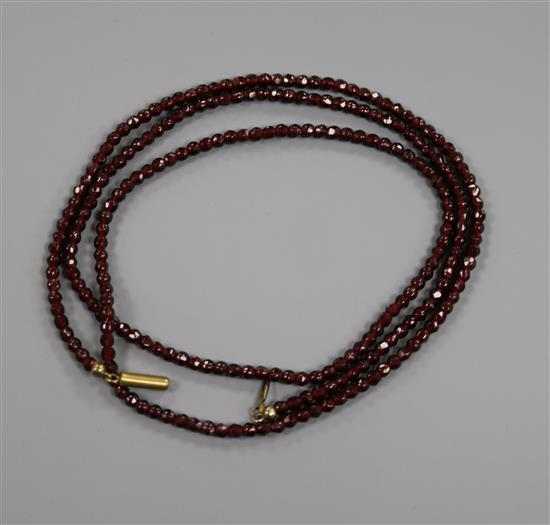 A garnet bead necklace, 78cm.